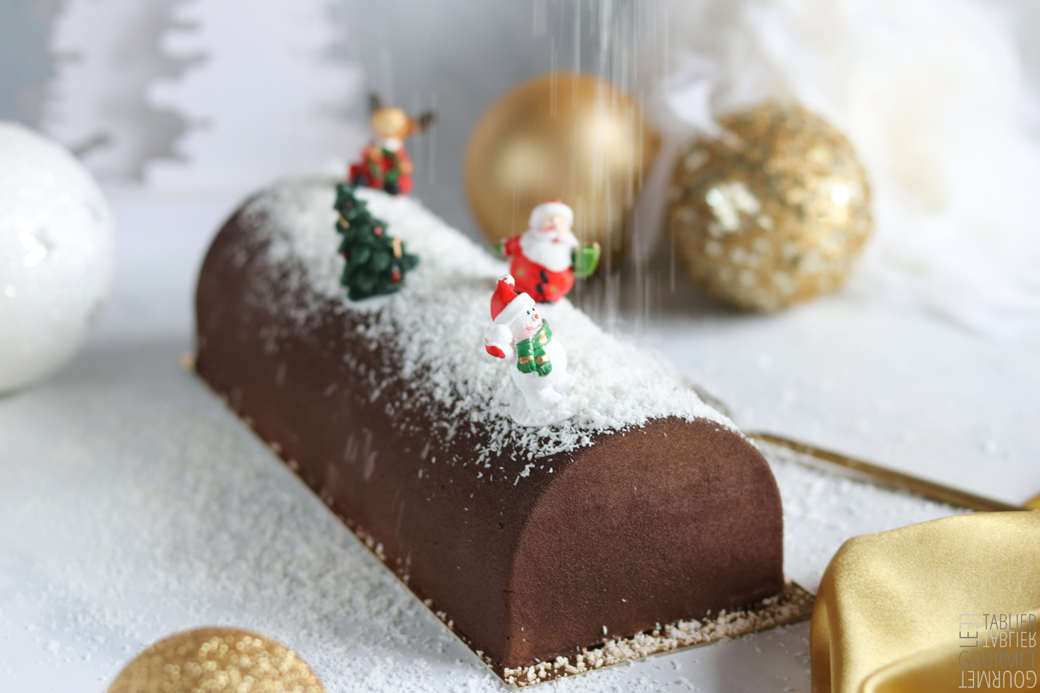 Pour un Noël sans gluten, cette bûche aux trois chocolats